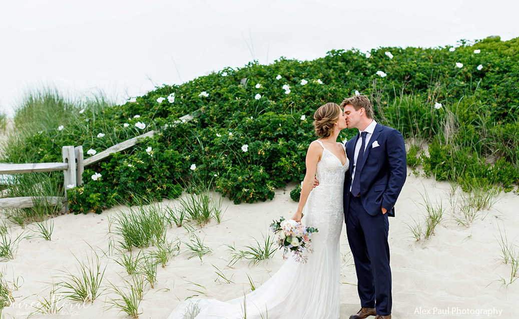 bride groom kiss beach