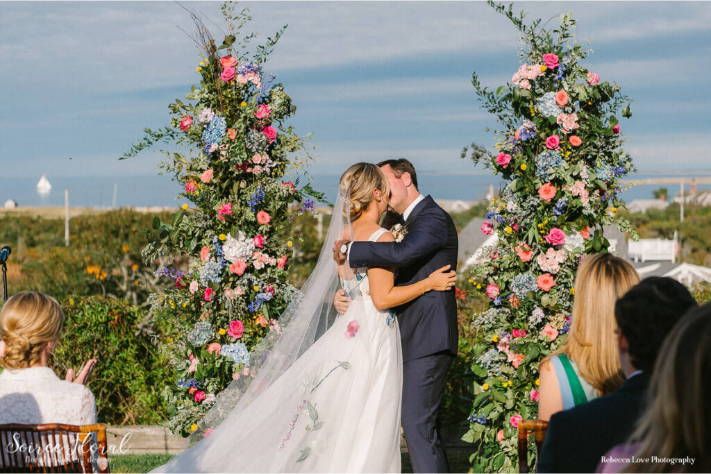 Colorful Floral Spires at Wedding Alter
